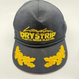 Black Cap with Yellow Embroidered 'Dry Strip' Logo